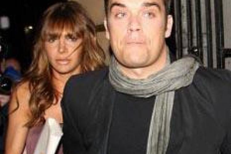 Robbie Williams si-a cerut logodnica in casatorie