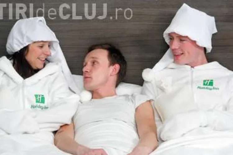 Lantul hotelier Holiday Inn ofera clientilor..."incalzitoare" umane pentru pat 