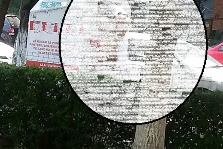 Bărbat prins în timp ce se ”servea” cu haine dintr-un container de donații la Cluj FOTO