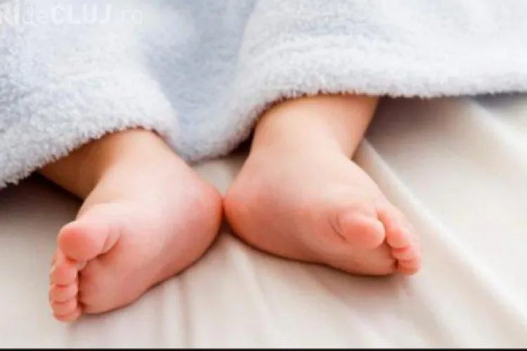 RECORD în România. I-a pus copilului 7 prenume