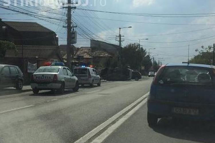 Accident pe strada Câmpina, din Cluj-Napoca! Un autoturism s-a răsturnat - FOTO