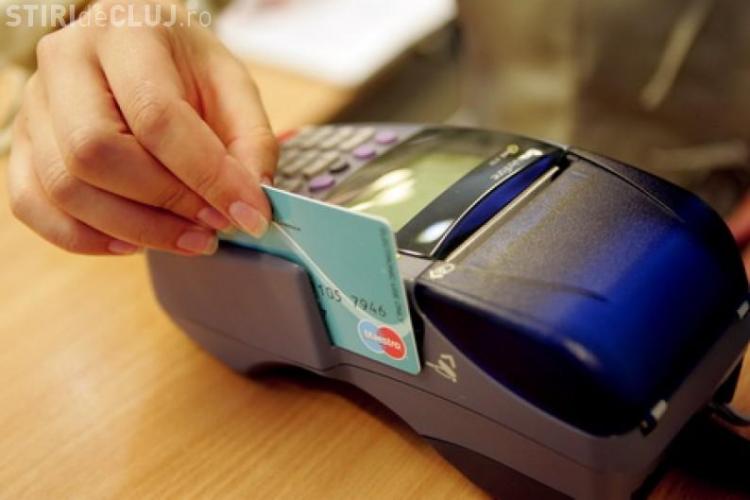 ANAF cere să aibă acces la plăţile cu cardul pe care românii le fac la magazine
