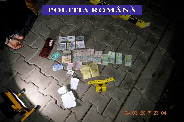 Escroc prins în flagrant de polițiștii clujeni în timp ce încasa bani de la o victimă. A păcălit-o cu metoda ”accidentul” FOTO/VIDEO