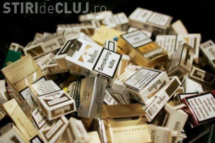 Contrabandă cu țigări la Cluj! Un bărbat a fost prins cu sute de pachete de țigări, în gara de la Dej