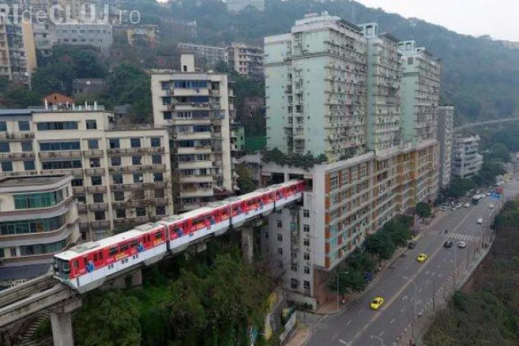 Alți pot face orice! Metroul care trece printr-un bloc de locuințe