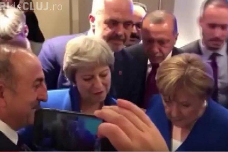 Angela Merkel, Theresa May și Erdogan, surprinși în timp ce se uită pe telefon la meciul Anglia-Croația VIDEO