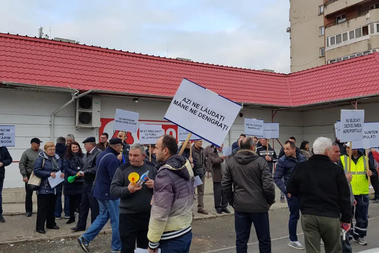 Motivele pentru care angajații de la Aeroportul Cluj protestează în fața Consiliului Județean Cluj