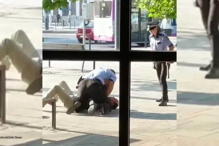 Cluj-Napoca: Doi polițiști locali s-au chinuit să pună cătușele unui bărbat - VIDEO