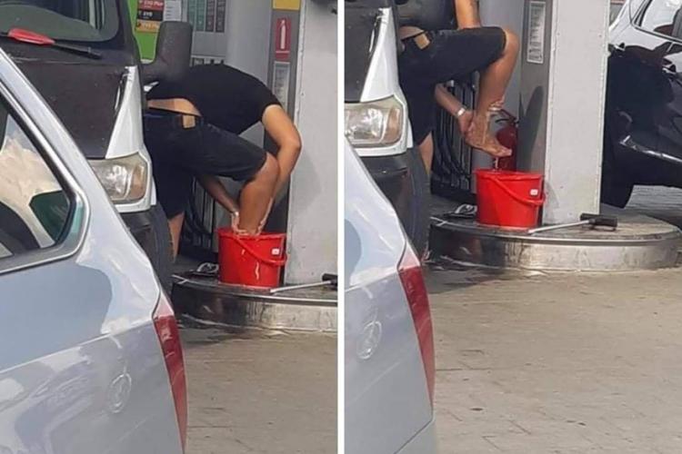 Un român și-a spălat picioarele în găleata de la benzinărie - FOTO