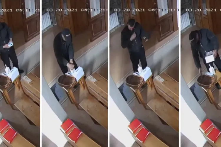 Hoț filmat când își dezinfecta mâinile și își face cruce în biserică, înainte de a fura banii din cutia milei - VIDEO