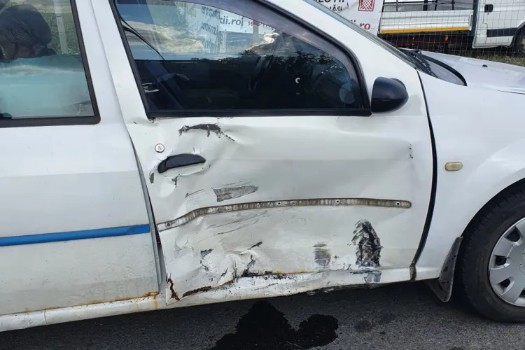 Accident între o motocicletă și un autoturism la târgul auto din Gilău - FOTO