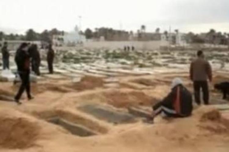 Au aparut gropile comune in Libia! Sute de oameni au fost omorati  VEZI imagini