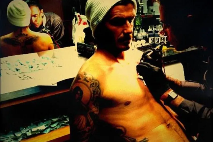 David Beckham si-a facut pe piept un tatuaj cu Isus si trei ingeri! - FOTO