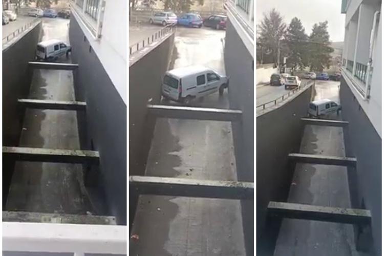 Cluj: Șofer blocat între pereții de la iesirea din parcare: Pe bombardieri nu-i duce capul să arunce o mână de sare  - VIDEO