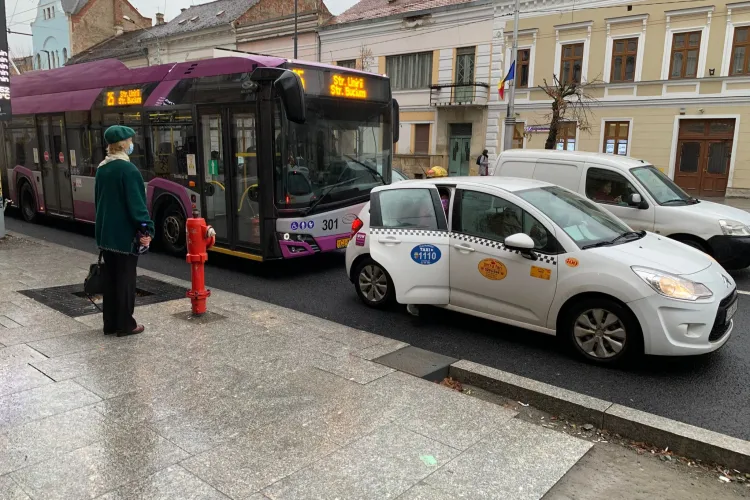 Cum i-a dat Boc afară pe taximetriști de pe banda de autobuz, de pe Bulevardul 21 Decembrie. Urmează un proces