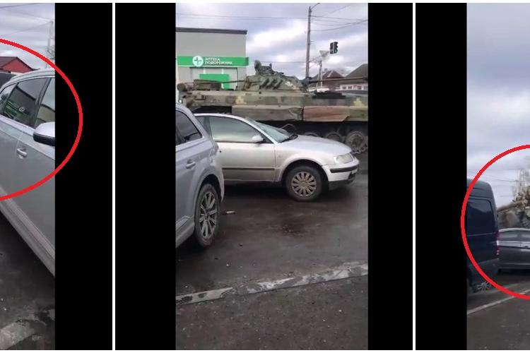 Tupeu maxim al rușilor! Momentul în care un tanc rusesc trece peste o mașină în Ucraina - VIDEO