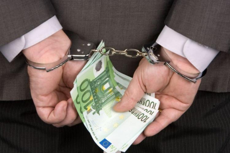 DNA Cluj a prins în flagrant un vicepreședinte de Consiliu Județean cu mâna pe bani   