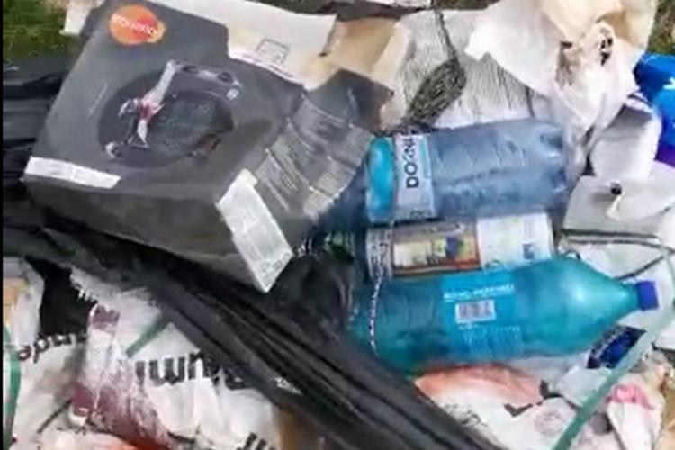 Cluj: Alt nesimțit care aruncă gunoaie și-a lăsat adresa pe deșeuri   
