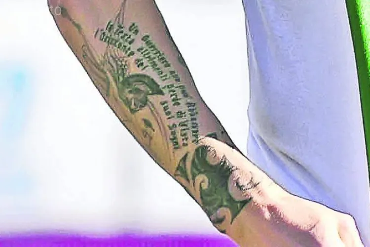 Mutu, razboinicul luminii! Si-a tatuat un text din Coelho