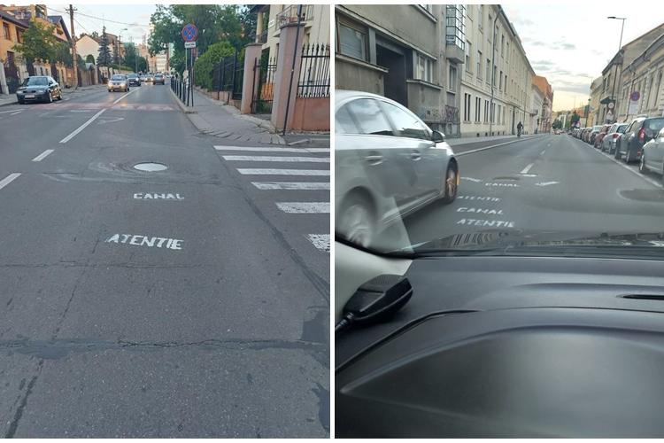 Cluj: Un șofer sătul de denivelări a scris pe asfalt ”Atenție - Canal”! Până la metrou sau centură, măcar drumurile să fie ca în palmă - FOTO   