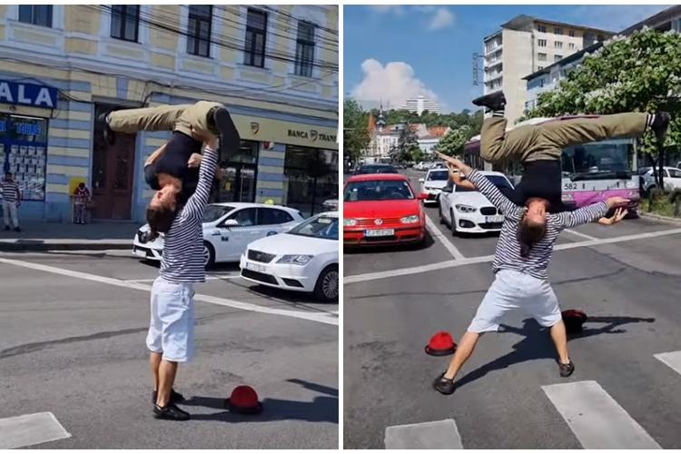 Doi acrobați au făcut spectacol în Piața Mihai Viteazu, pe trecerea de pietoni - VIDEO 