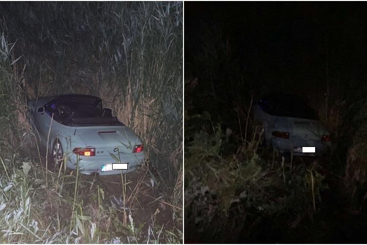 Cluj: Un BMW Z2 a zburat de pe drum, în timpul liniuțelor de pe Moș Ion Roată. ”Băiețașii” s-au făcut de râs, încercând să scoată mașina - VIDEO