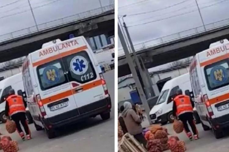 Uimitor! Un ambulanțier a fost fotografiat când încărca un sac cu cartofi în locul unde sunt ținuți pacienții 