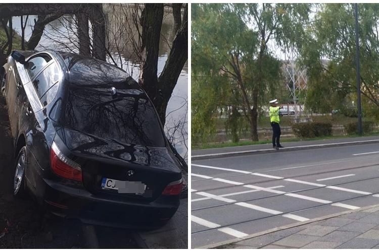 Un BMW era să cadă în Someș, lângă Cluj Arena! Ploaia l-a derutat pe șofer - FOTO