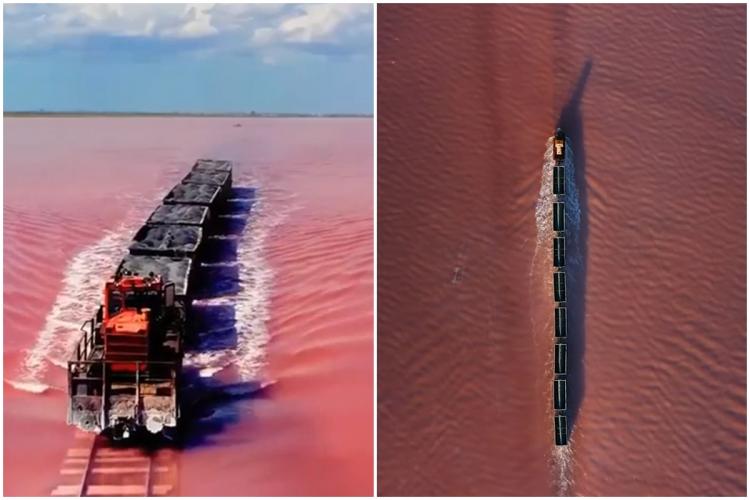 VIDEO. O scenă ruptă parcă din basme, cu trenul care traversează un lac de culoare roz, care nu pare a fi din această lume. Despre ce locație este vorba?