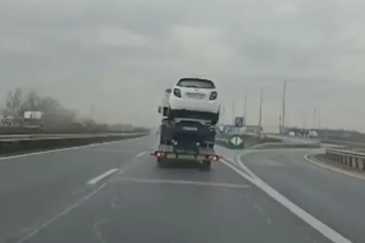 Român prins în Ungaria în timp ce transporta o mașină în remorca unui autovehicul aflat pe o platformă - FOTO