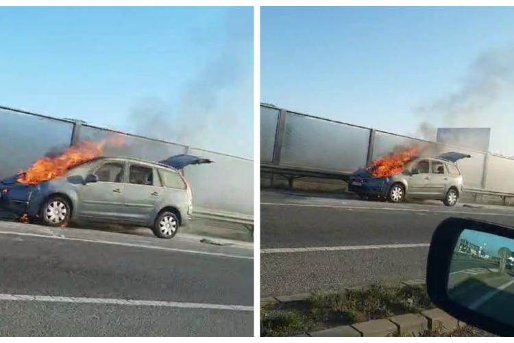 O mașină a luat foc pe un drum important din Cluj-Napoca. Șoferii au trecut fără oprească - VIDEO și FOTO