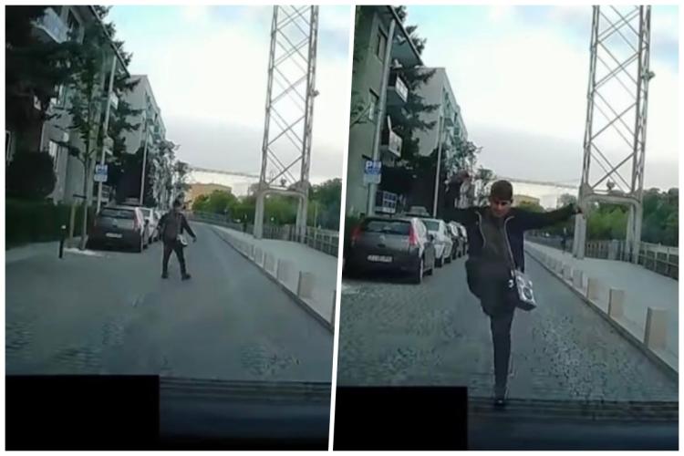  Situație neobișnuită pe o stradă din Cluj-Napoca. Un bărbat a sărit intenționat în fața unei mașini, în încercarea de a o opri - VIDEO