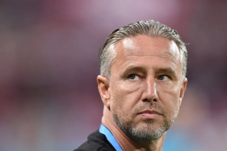 Emil Boc ar fi negociat în secret cu Laurențiu Reghecampf! Ce lovitură vrea să dea U Cluj