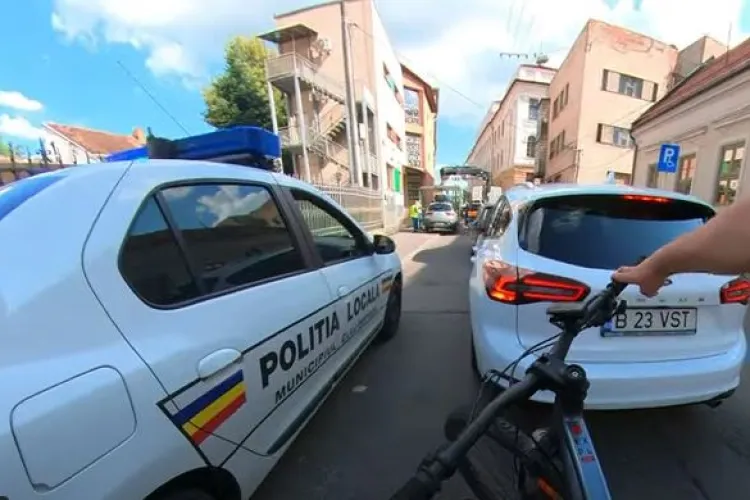 Clujean revoltat că se ridică mașini, foarte agresiv cu polițiștii locali: ”Meritați un pumn în gură!” VIDEO