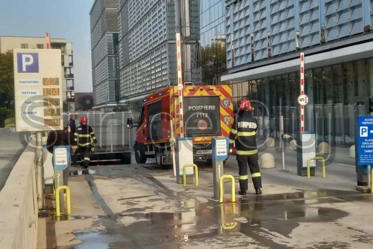 VIDEO. 300 de persoane evacuate dintr-o clădire de birouri din Cluj! O mașină a luat foc în parcarea subterană a clădirii de pe B-dul 21 Decembrie 