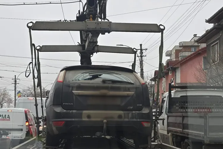„Băieții” de la ridicări își continuă munca pe străzile clujene! Un șofer „norocos” s-a trezit cu mașina transportată la Someșeni 