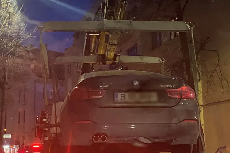 Un bucureștean cu BMW a crezut că face legea la Cluj! Și-a parcat bolidul într-un loc interzis, iar „băieții” de la ridicări n-au stat pe gânduri