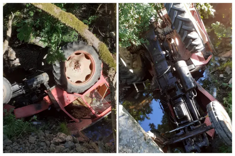 Cluj- Accident grav: Un tractor s-a răsturnat de pe un pod și a căzut în albia râului. Șoferul rănit, blocat în cabină, a fost scos de localnici FOTO 