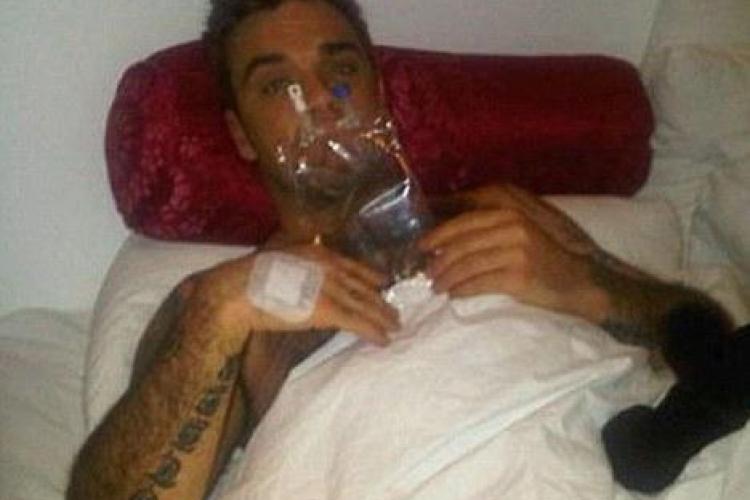 Robbie Williams, internat in spital cu toxiinfectie alimentara - FOTO