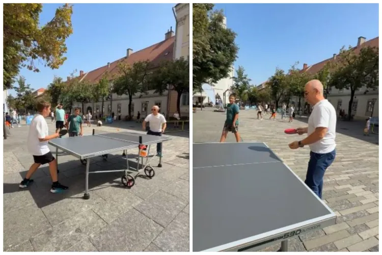 VIDEO Emil Boc a jucat tenis de masă cu copiii în centrul Clujului. Evenimentul „Străzi deschise” a avut loc în zona Universității