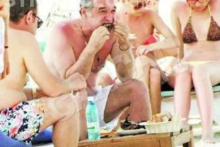 Gigi Becali a mancat pastrama de oaie pe plaja VIDEO