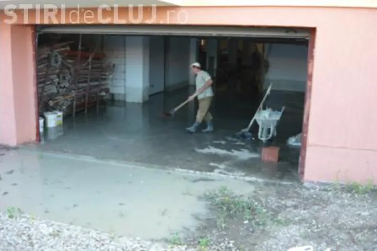 Blocul construit de politistul Radu Ciorca in Apahida "crapa": dejectiile s-au revarsat in garaje FOTO