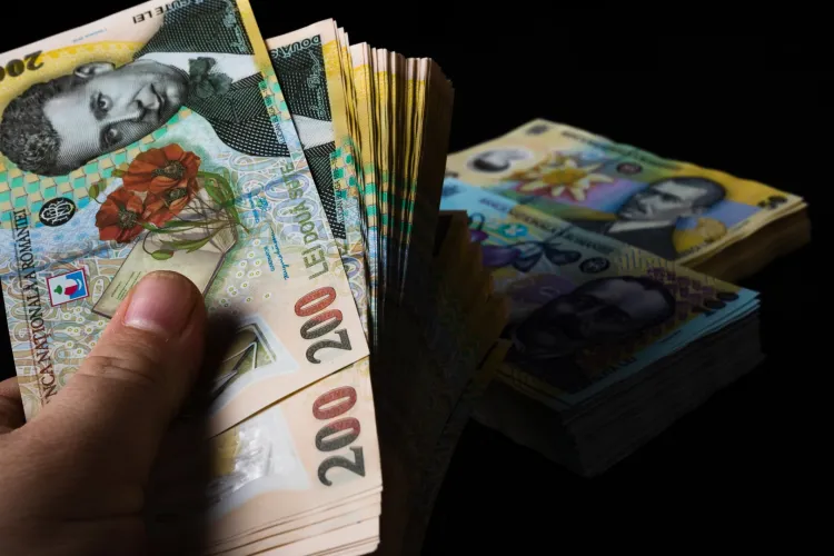 Vești îngrijorătoare pentru români: CFA România anticipează leu mai slab, creștere economică sub 1% și deficit bugetar ridicat în 2026