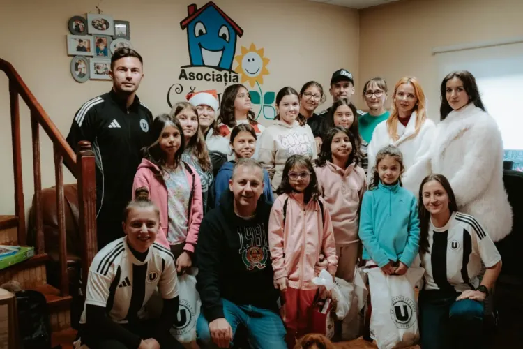 FC Universitatea Cluj aduce magia sărbătorilor la „Căsuța Bucuriei”: Cadouri și zâmbete pentru 11 fete minunate