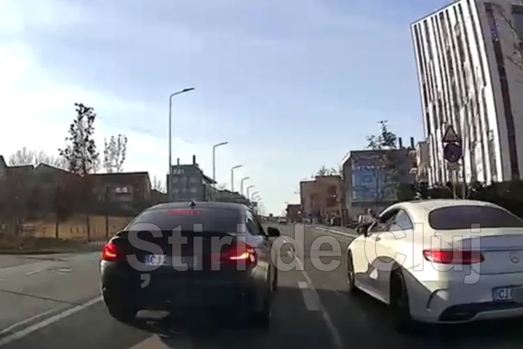 VIDEO. Șicanare urâtă în Cluj! Șofer, blocat de un cunoscut interlop într-un Mercedes și soția lui în BMW: „Cu rabla aia dai flash-uri la BMW?”