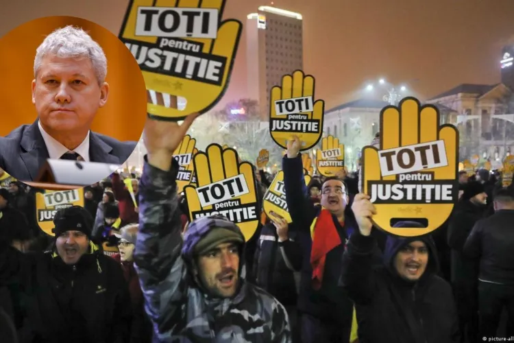 Paradox total în politica din țară: Cătălin Predoiu a fost premiat în SUA pentru cariera sa, în timp ce românii îi cer demisia în stradă