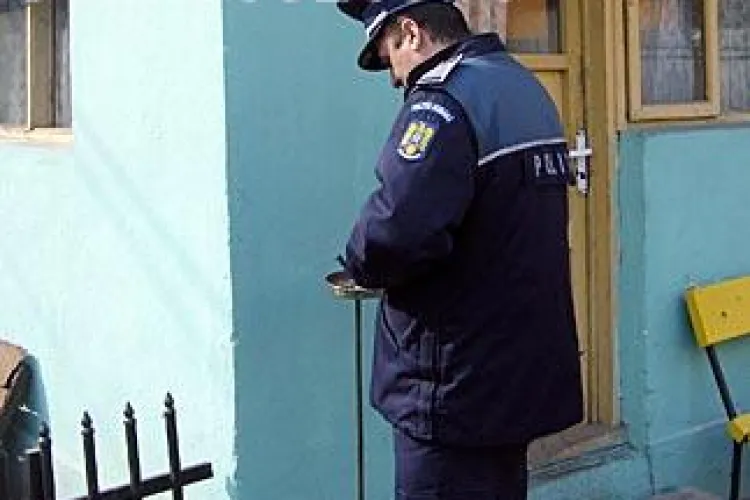 Politist din Frata batut de un taran! Agentul si-a folosit pistolul, dar agresorul a fost pus la "respect" de localnici VIDEO