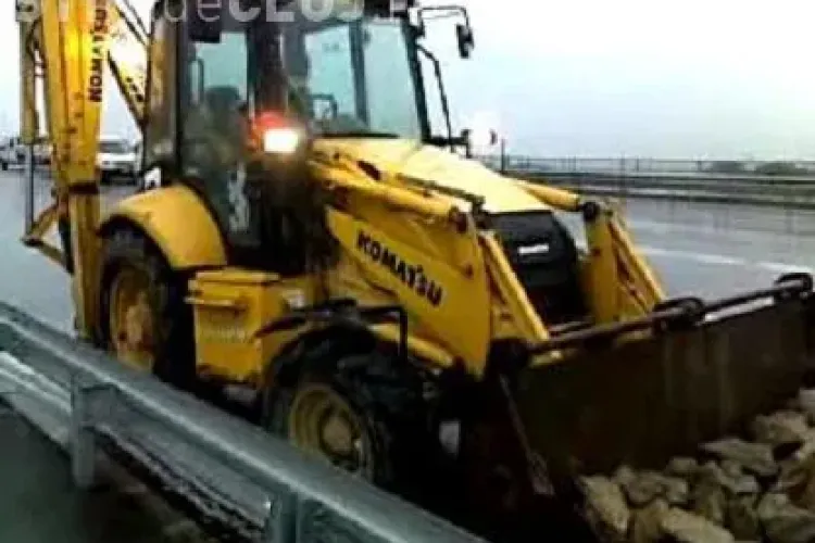 Elan muncitoresc: Vizita  de astazi a lui Boc  i-a facut pe muncitori sa lucreze la centura Valcele - Apahida si pe ploaie azi-dimineata VIDEO