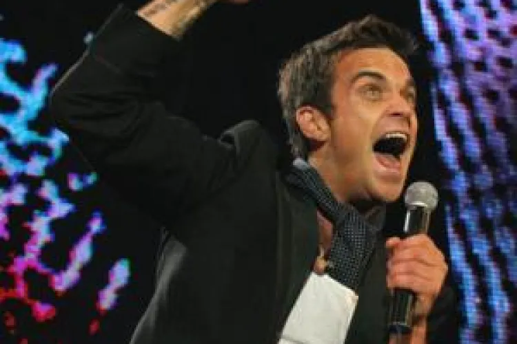 Robbie Williams este preferat pentru interpretarea imnului neoficial al Cupei Mondiale 2010 din Africa de Sud