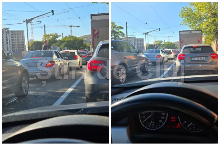 VIDEO. Teribilism în trafic, pe Bulevardul Muncii din Cluj-Napoca! Un pasager circulă cu jumătate de corp ieșit prin trapa mașinii: „Inconștient!”
